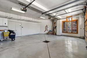 Garage featuring a garage door opener