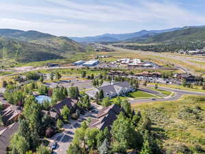 Aerial view of residential area with a mountain backdrop