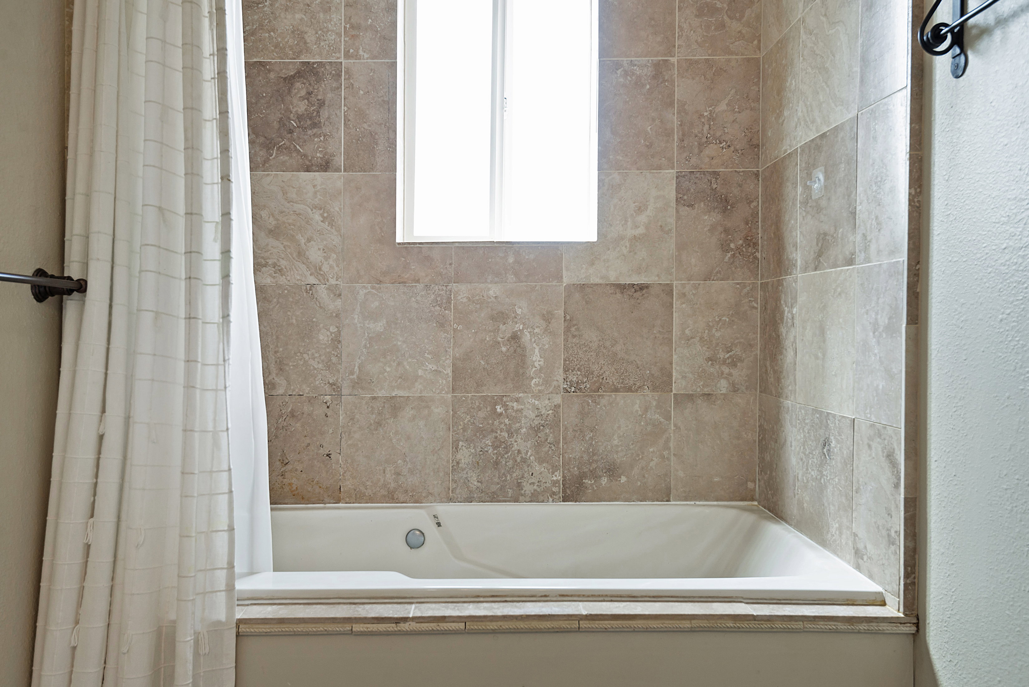 Bathroom featuring shower / bath combo