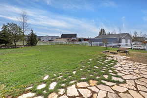View of yard featuring an outdoor structure