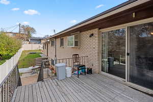 Wooden deck with a patio area
