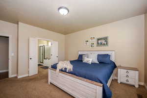 Primary Bedroom with french doors into ensuite
