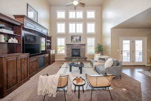 Family room with a healthy amount of natural light, fireplace and built-in entertainment center