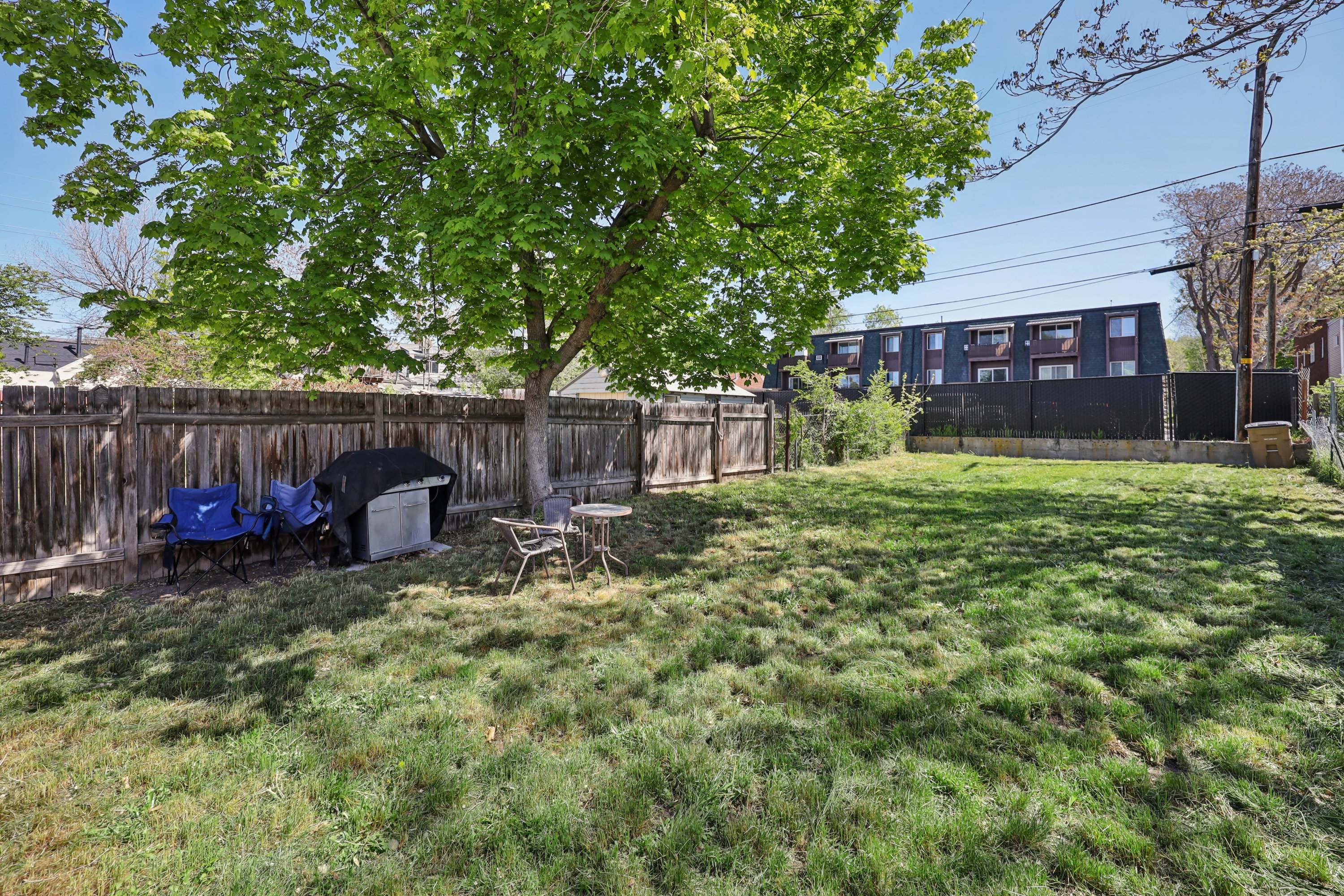 View of fenced backyard