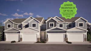Craftsman house featuring stone siding and driveway
