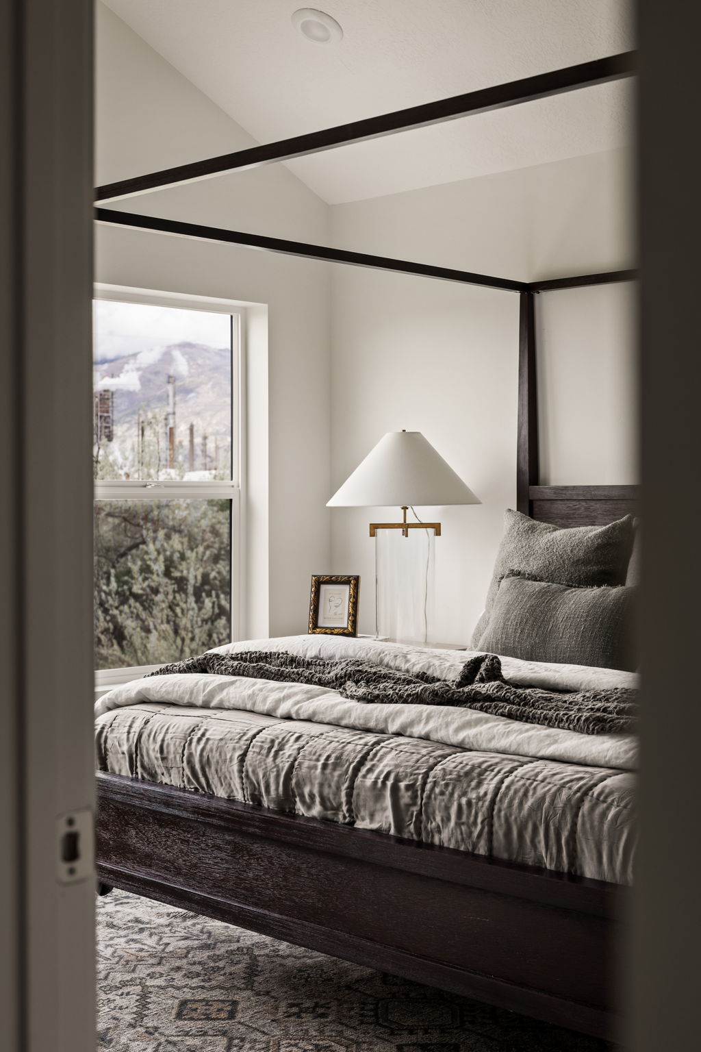 Bedroom featuring lofted ceiling