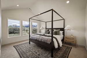 Bedroom with light colored carpet, vaulted ceiling, recessed lighting, and a mountain view