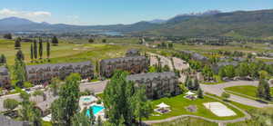 Aerial view of residential area featuring a water and mountain view