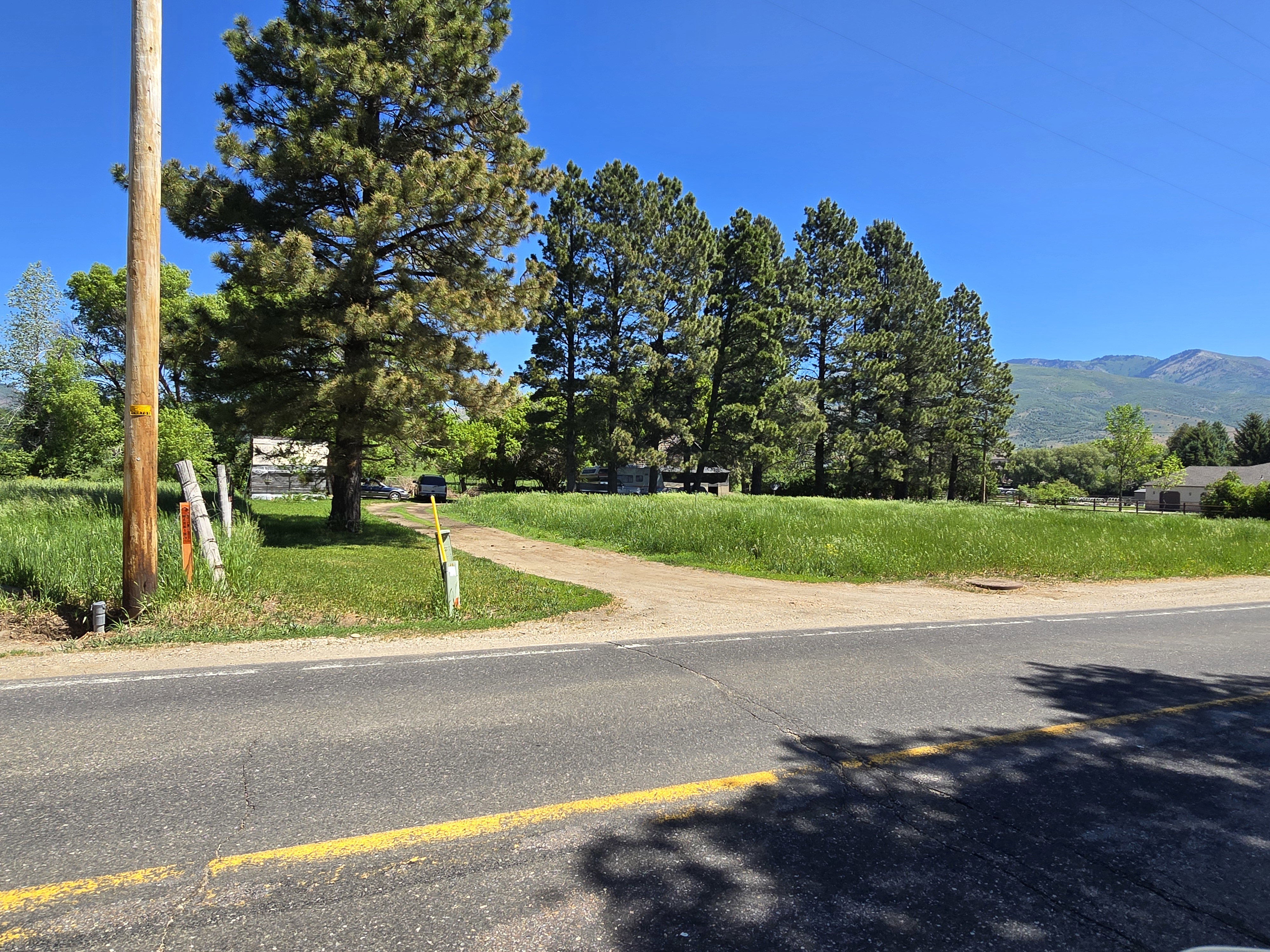 View of asphalt road with a mountain view