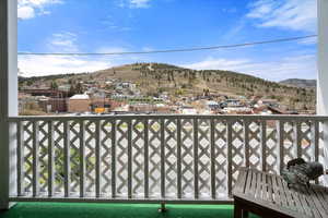 Front exterior balcony featuring spectacular mountain views.