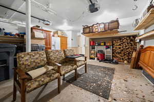 2 car garage with workbench and extra storage.