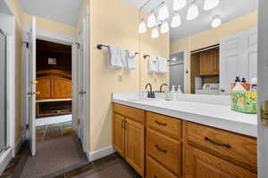 Fourth floor 3/4 bath with en suite water closet, shower, and double vanity.