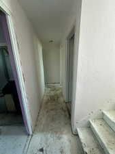 Hall with a textured wall
