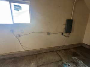 Below grade area with electric panel