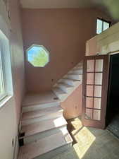 Stairs with a high ceiling