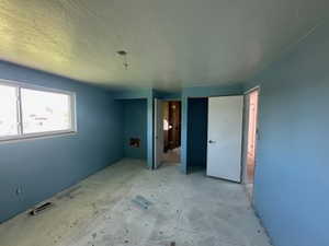 Unfurnished bedroom featuring two closets