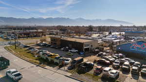 Bird's eye view of a commercial area and a mountainous background