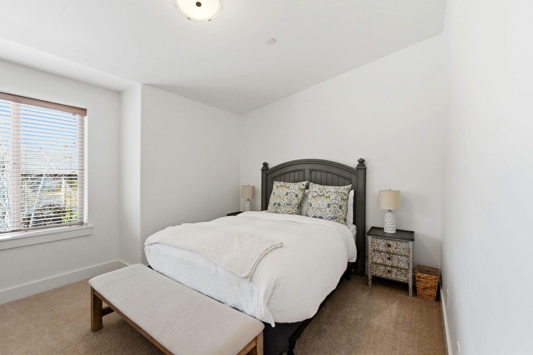 Carpeted bedroom with baseboards