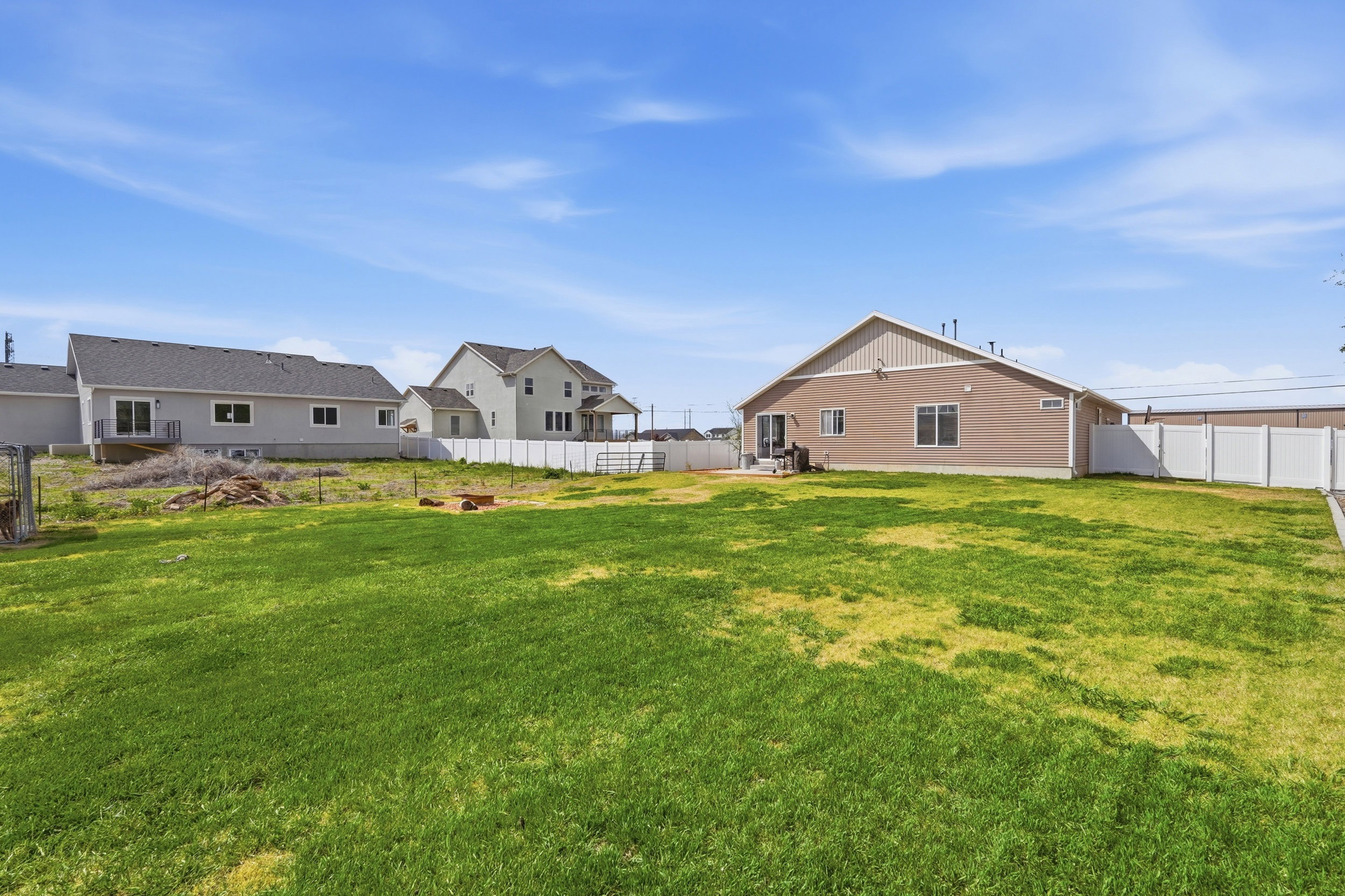 View of fenced backyard