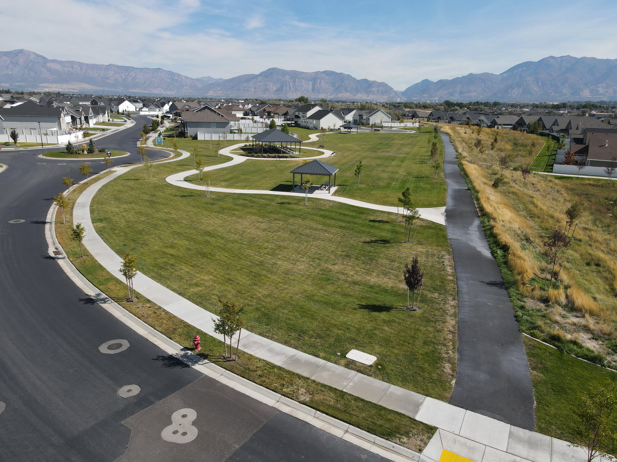 Aerial view of residential area with a mountainous background