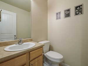 Bathroom vanity with an integrated sink and chrome faucet