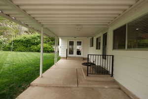 View of patio featuring french doors