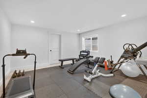 Exercise area featuring recessed lighting
