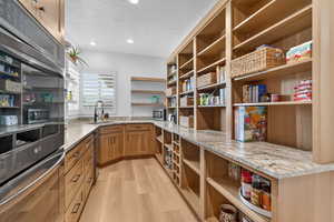 Storage area featuring a sink
