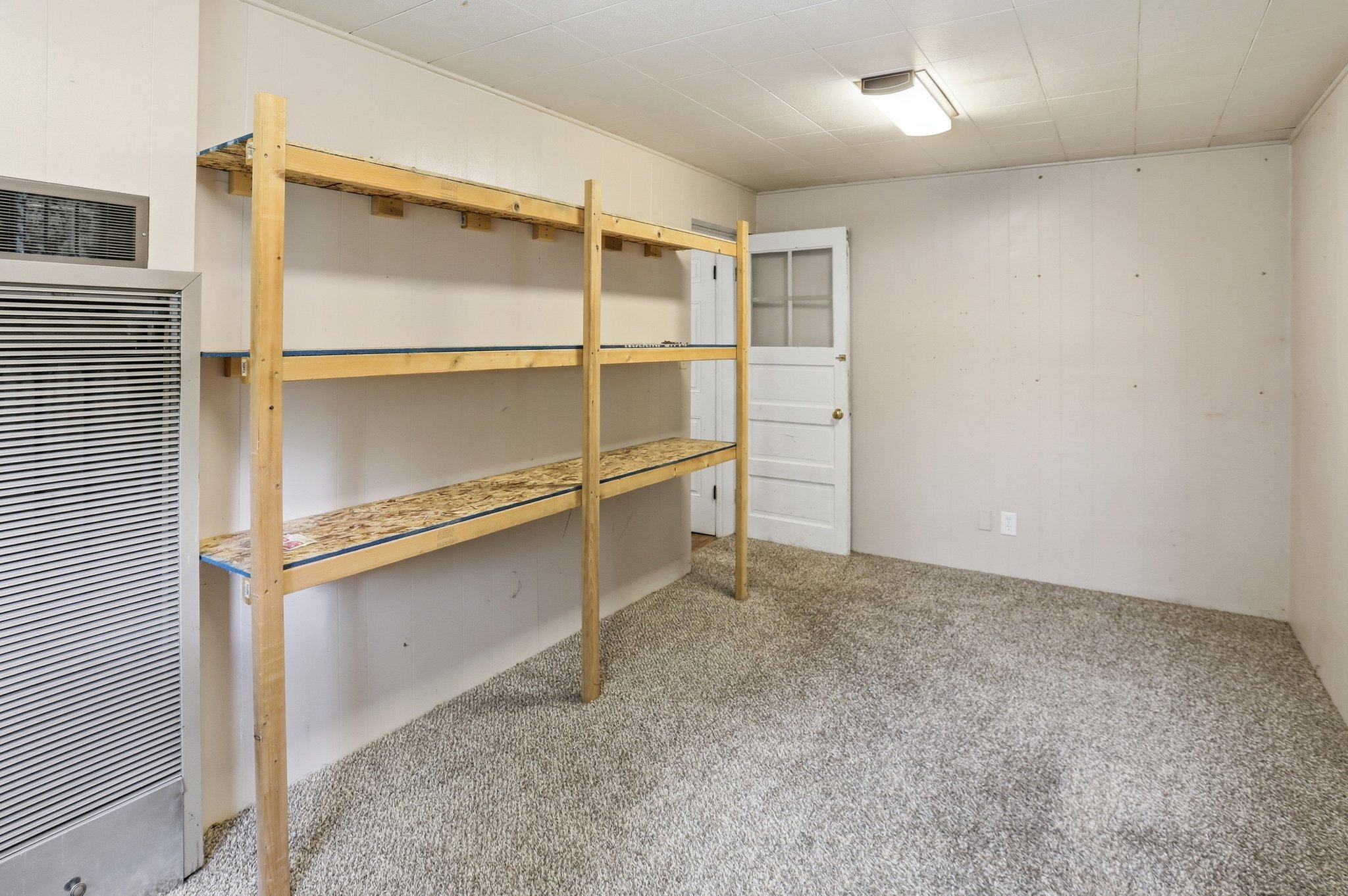 Storage area featuring a heating unit