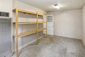 Storage area featuring a heating unit