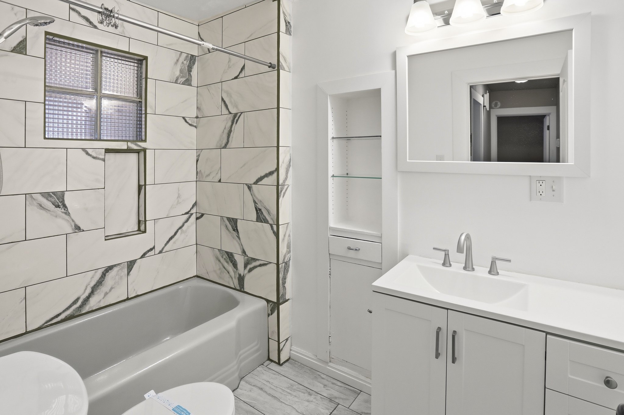 Full bath with vanity and  shower combination