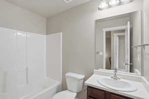 Full bathroom with vanity and shower / tub combination