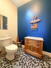 Bathroom with baseboards and vanity