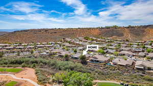 Aerial perspective of suburban area featuring mountains