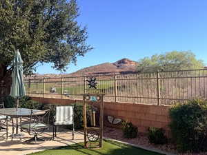 Fenced yard with outdoor dining area