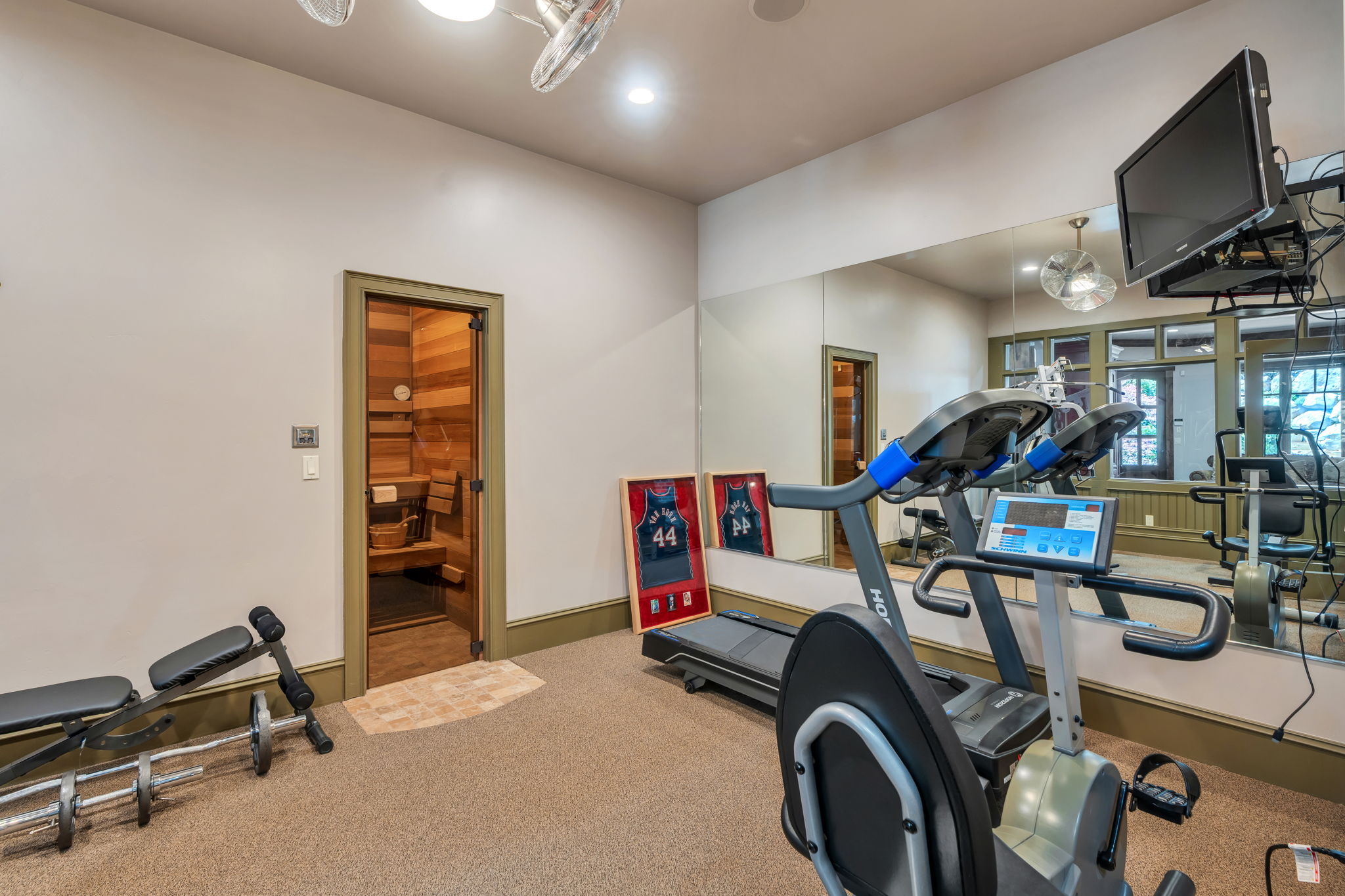 Workout room with a sauna / steam room and recessed lighting