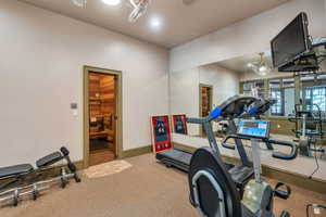 Workout room with a sauna / steam room and recessed lighting