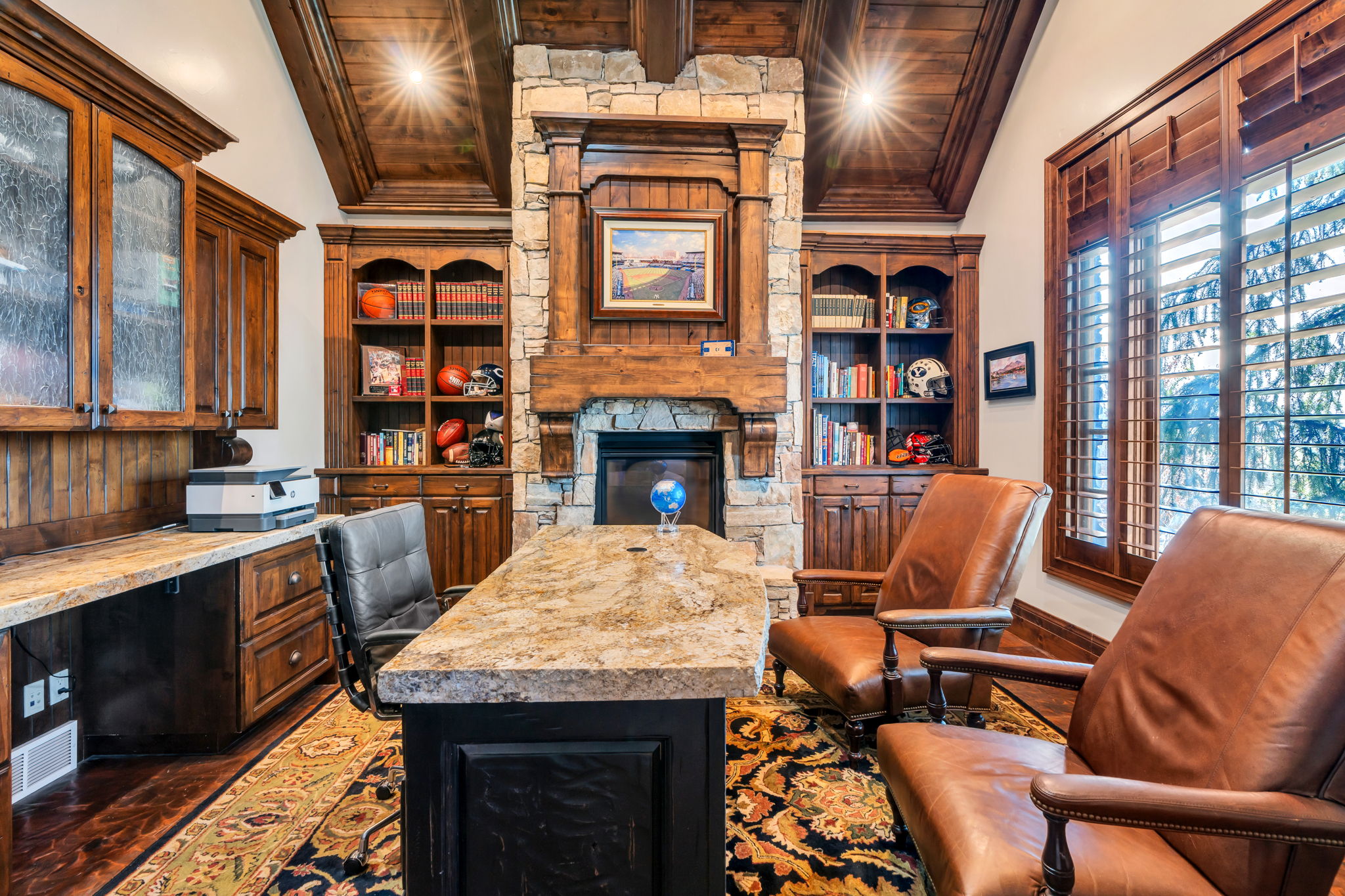 Office with dark wood-type flooring, a fireplace, wooden ceiling, and recessed lighting