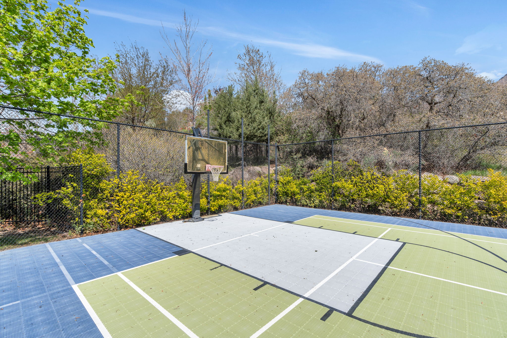 View of basketball court featuring community basketball court