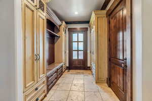 Mudroom with stone tile flooring