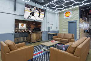 Lobby featuring wood walls