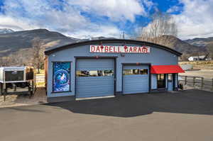 View of commercial location featuring a mountain view