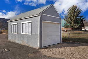 Detached garage with a mountain view