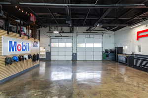 Garage with freestanding refrigerator