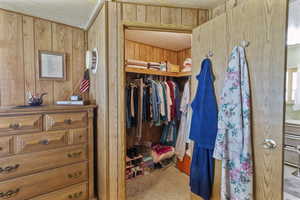 Walk in closet in the ensuite bedroom.