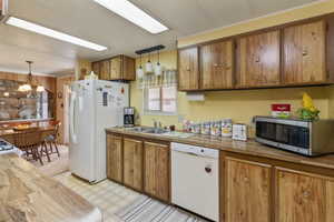 Built in dishwasher included with sale, as well as refrigerator.