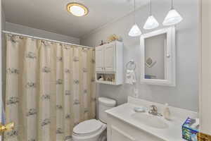 Second bathroom featuring a tub and shower.
