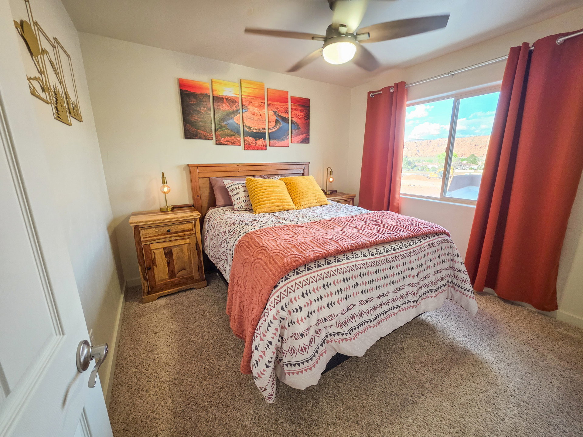 Bedroom featuring carpet floors and ceiling fan