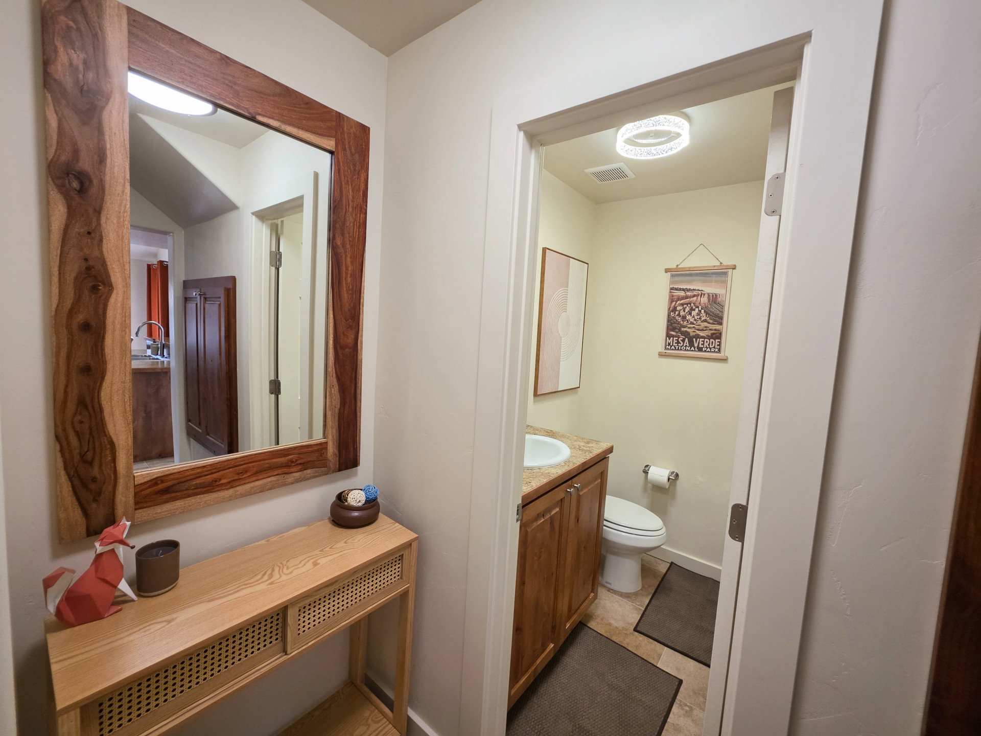 Bathroom with vanity and light tile patterned floors