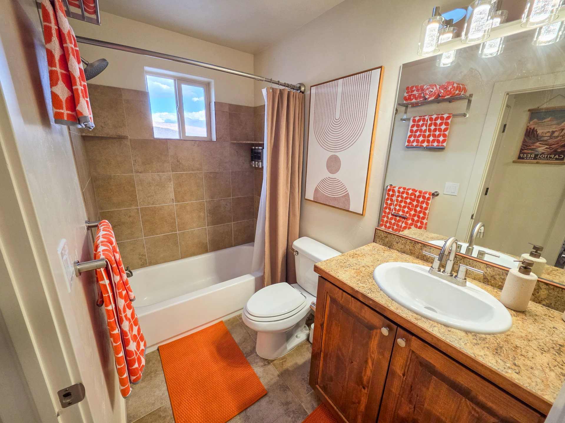 Full bath featuring vanity and shower / bathtub combination with curtain